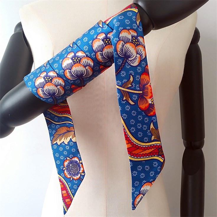Scarf printer printing designs on the silk skinny scarves